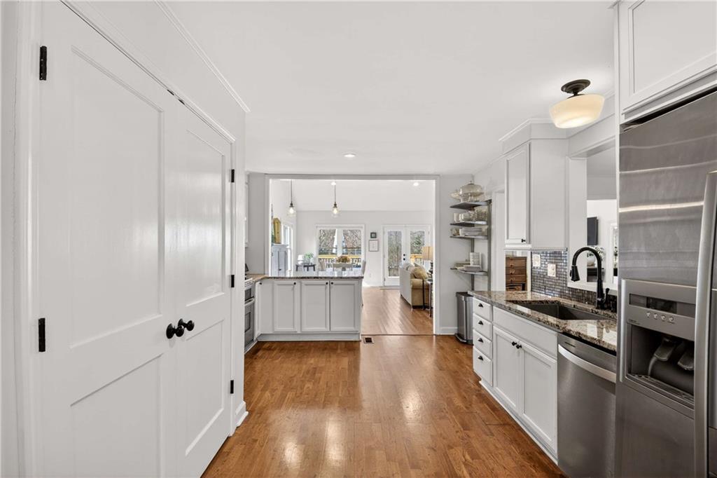 760 Scott Circle Decatur, GA 30033 - Photo 14 of 48 a kitchen with stainless steel appliances a refrigerator and a stove top oven
