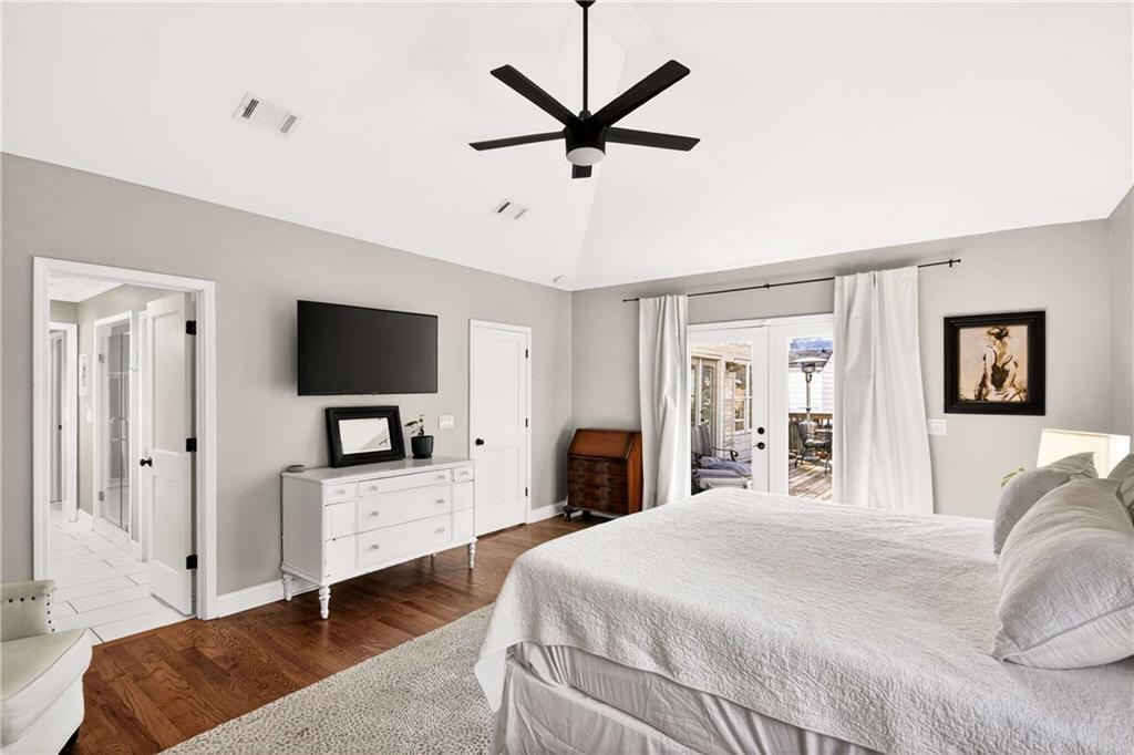 760 Scott Circle Decatur, GA 30033 - Photo 23 of 48 a bedroom with a bed window and a flat screen tv