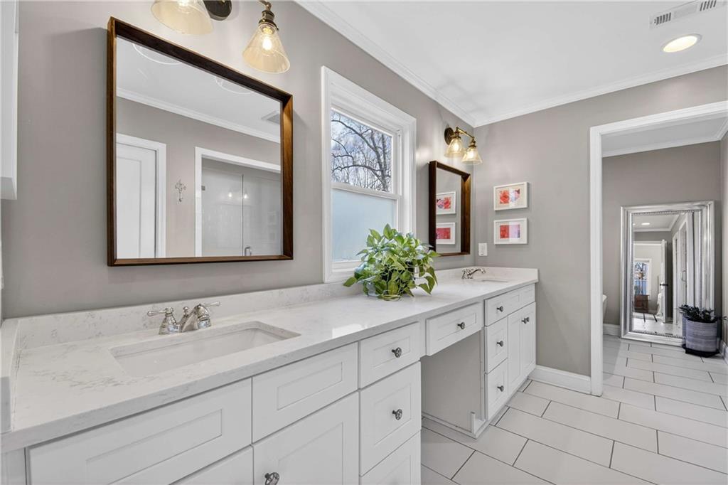 760 Scott Circle Decatur, GA 30033 - Photo 25 of 48 a bathroom with a sink and a mirror