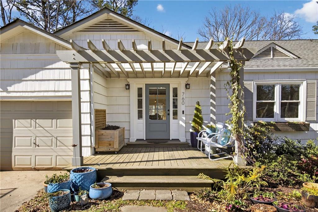 760 Scott Circle Decatur, GA 30033 - Photo 3 of 48 a front view of a house with a garden