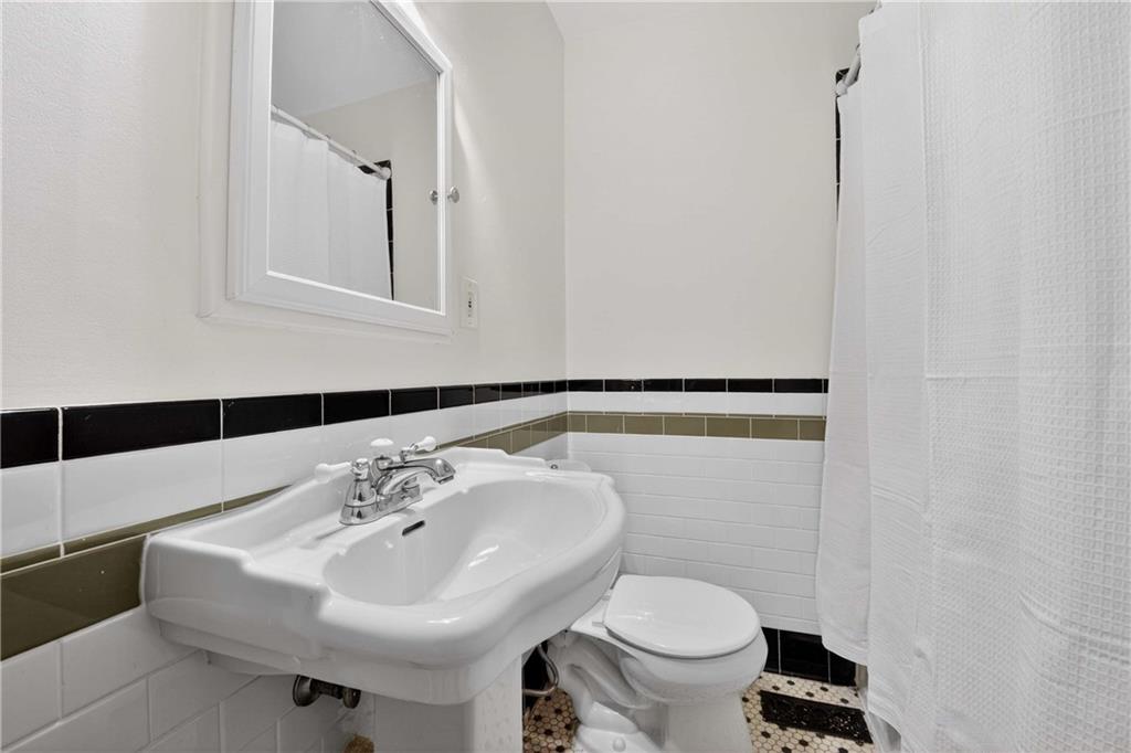 760 Scott Circle Decatur, GA 30033 - Photo 31 of 48 a bathroom with a sink and a toilet