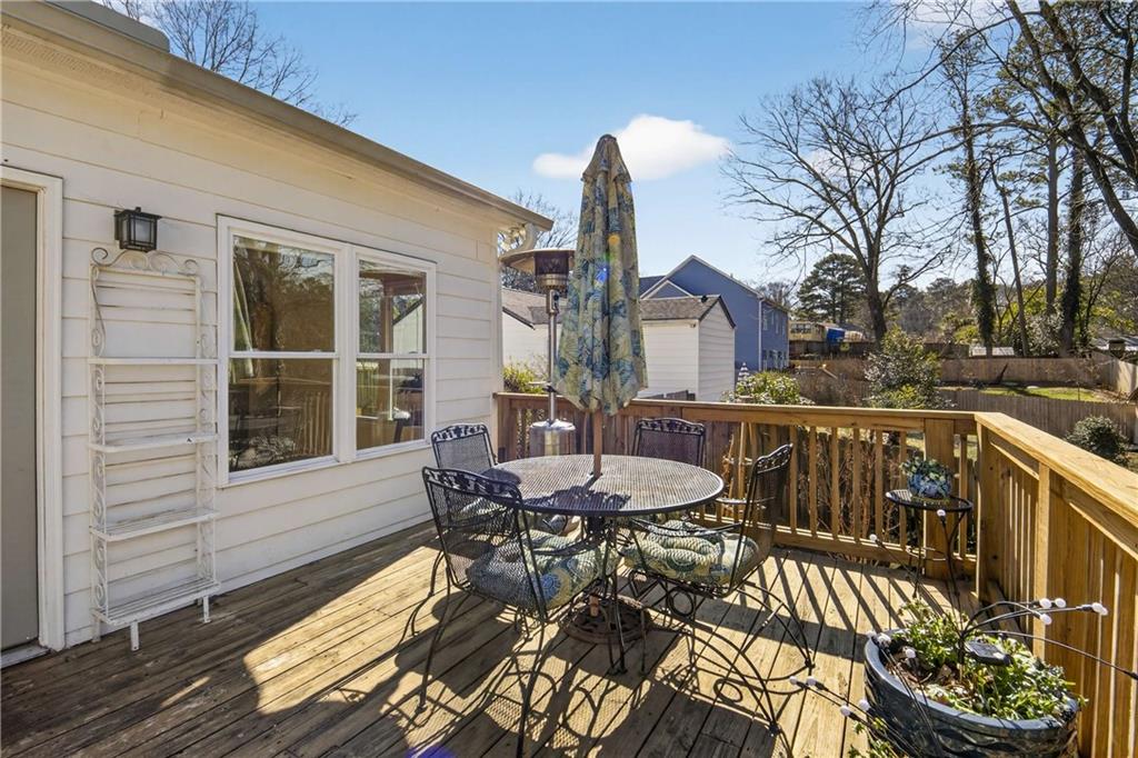 760 Scott Circle Decatur, GA 30033 - Photo 38 of 48 a view of a patio with a table and chairs