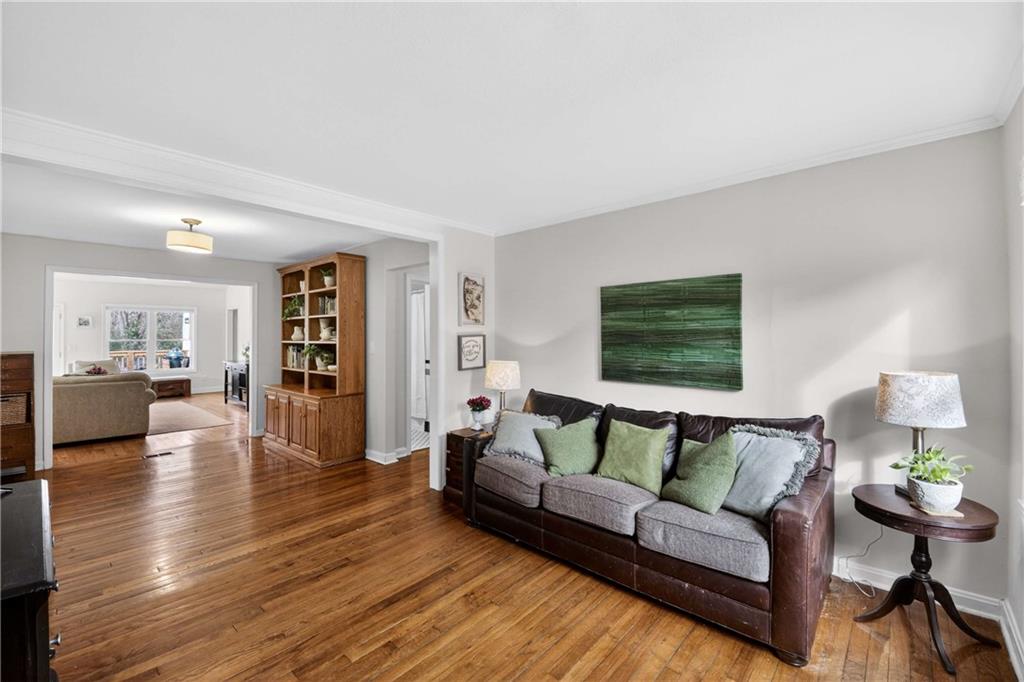 760 Scott Circle Decatur, GA 30033 - Photo 6 of 48 a living room with furniture and a wooden floor