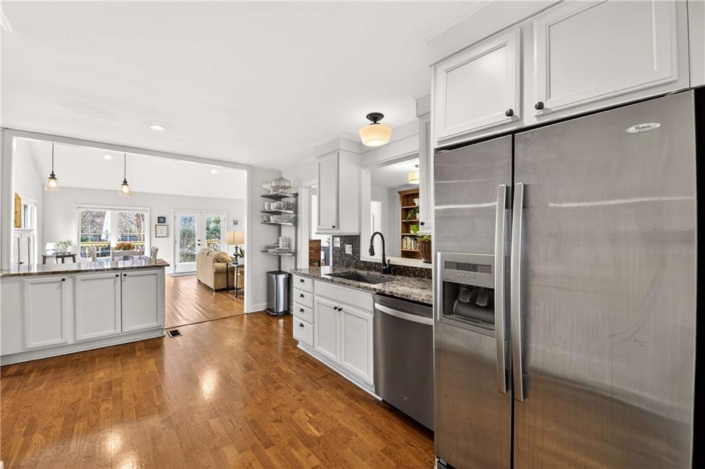 760 Scott Circle Decatur, GA 30033 - Photo 9 of 48 a large kitchen with cabinets and stainless steel appliances