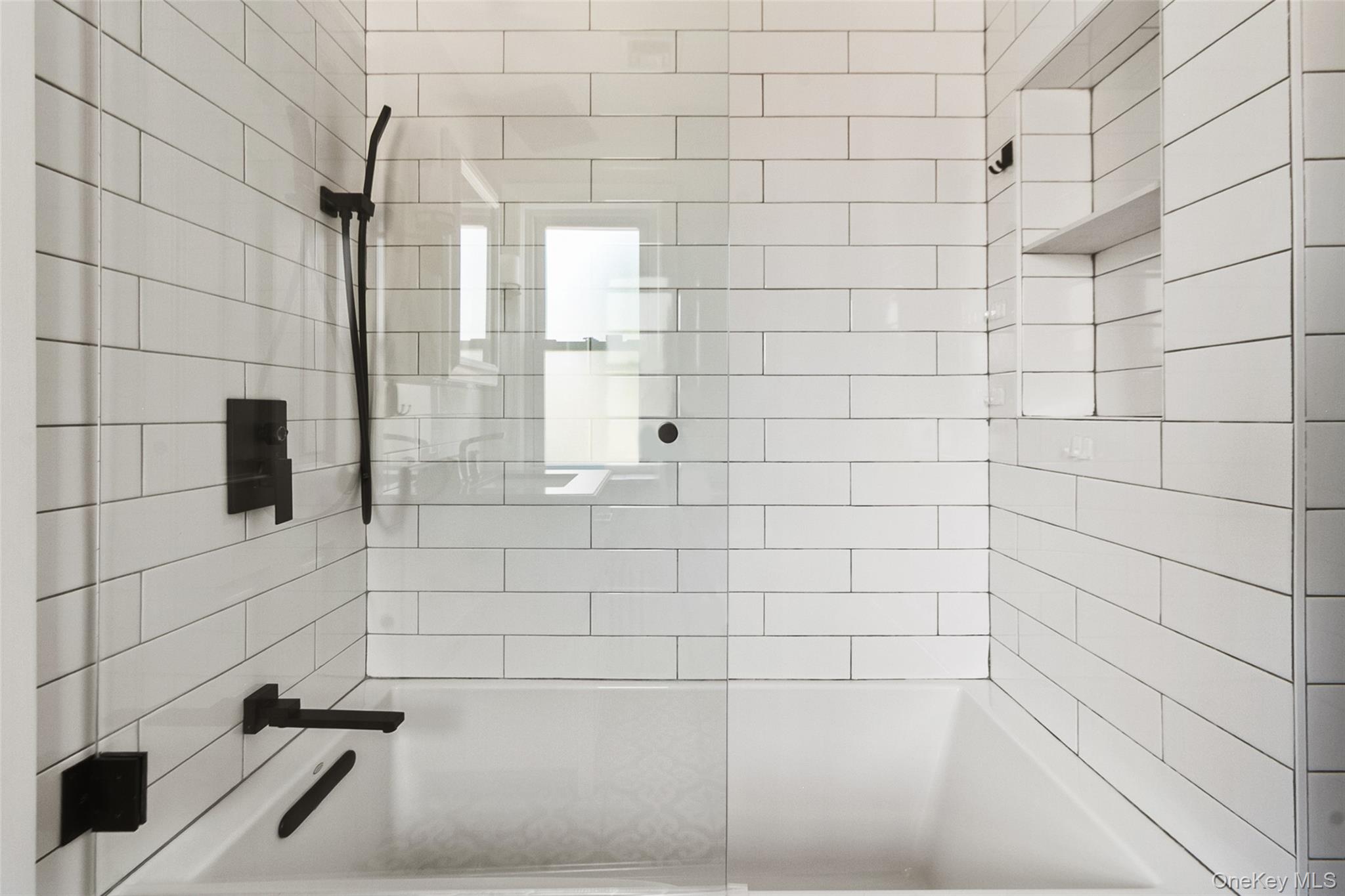 11 Crawford Street Yonkers, NY 10705 - Photo 17 of 24 Full bath featuring tiled shower / bath