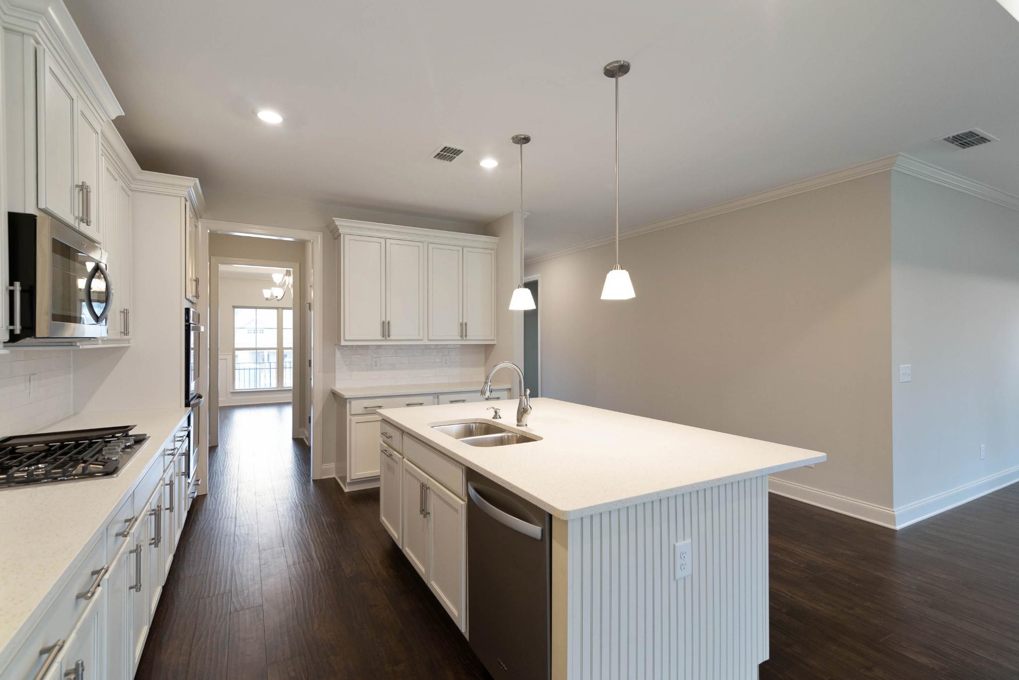 647 Castle Road Mount Juliet, TN 37122 - Photo 5 of 11 a kitchen with sink stove and refrigerator