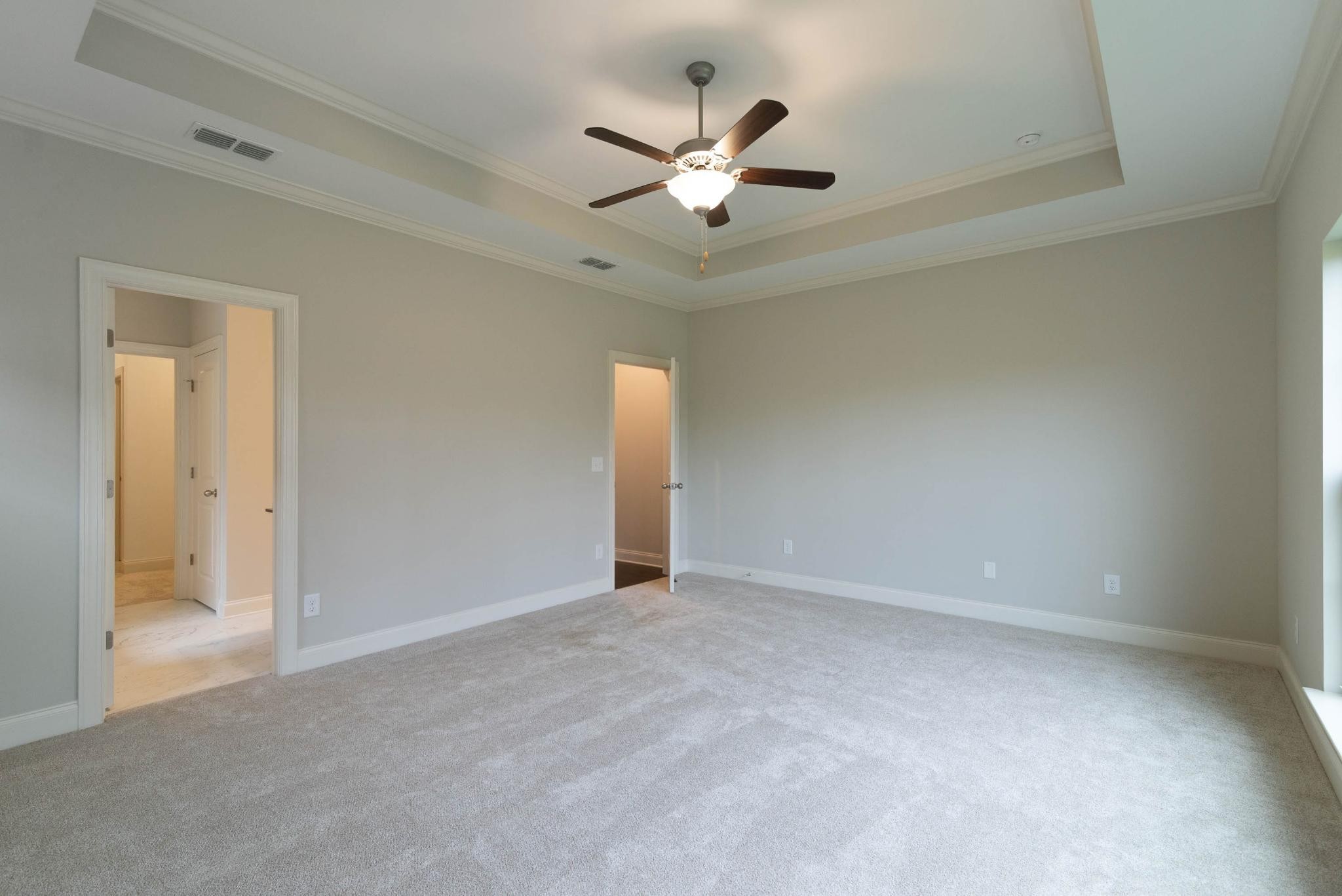 647 Castle Road Mount Juliet, TN 37122 - Photo 6 of 11 an empty room with a ceiling fan and a window