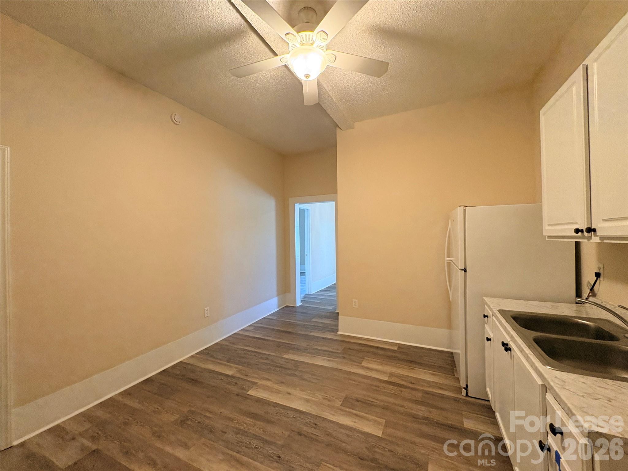 1109 6th Street, Unit B Lancaster, SC 29720 - Photo 11 of 22 a bathroom with a sink and a mirror