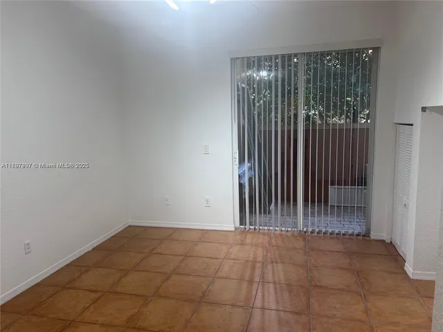 a view of outdoor space with sliding door