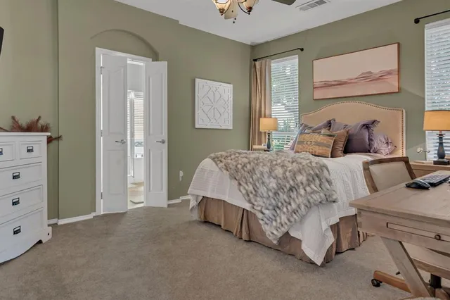 a view of kitchen with refrigerator dining table and chairs