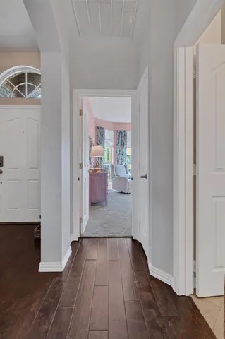 a bedroom with a bed and a table