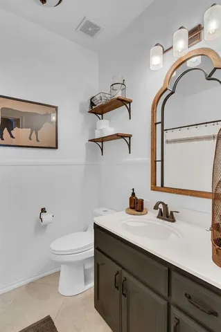 a view of hallway with wooden floor