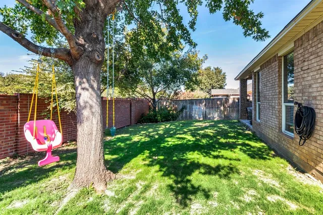 a view of a house with porch and sitting area