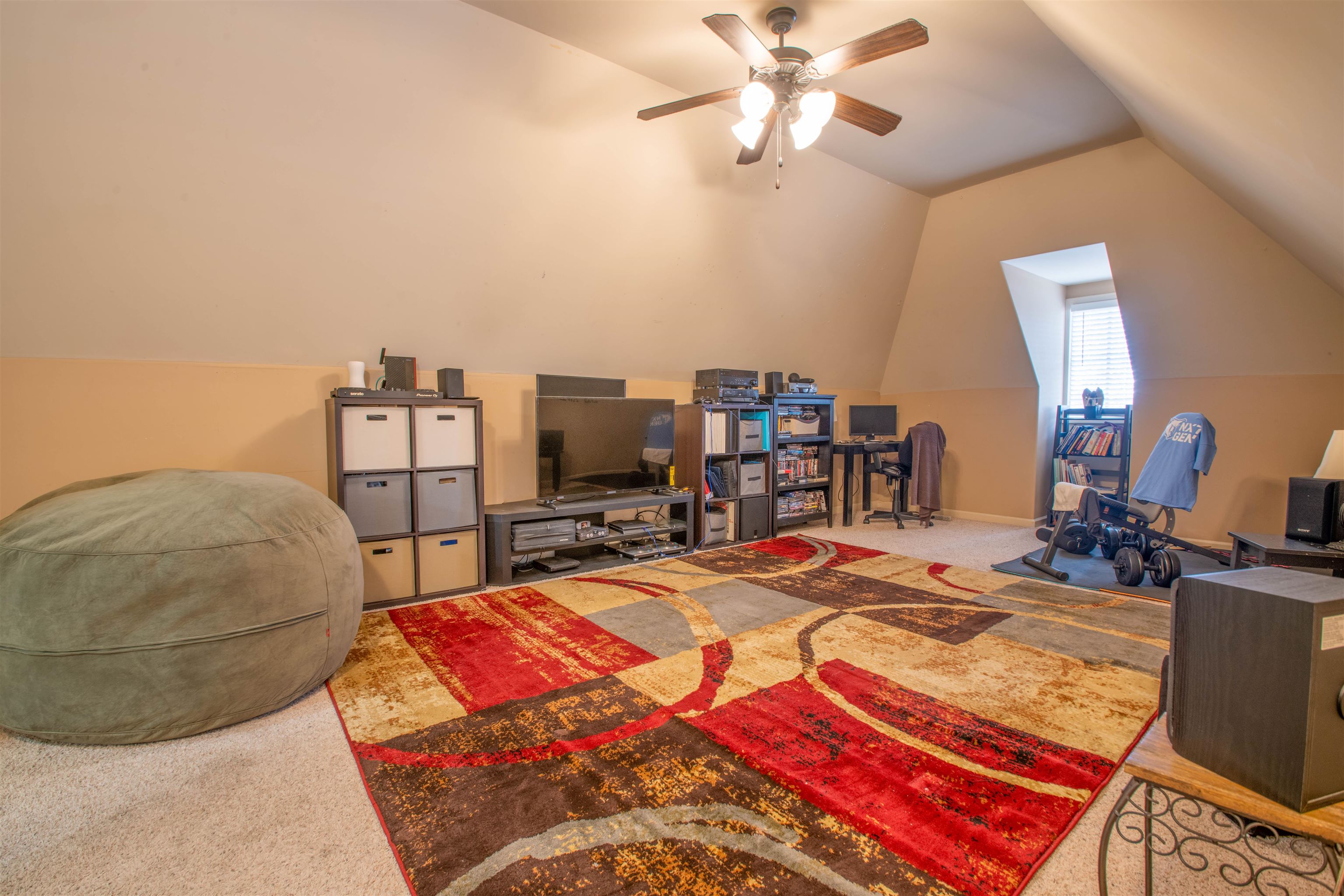 8722 Brunswick Forest Drive Bartlett, TN 38133 - Photo 25 of 38 Interior space with carpet floors, ceiling fan, and vaulted ceiling