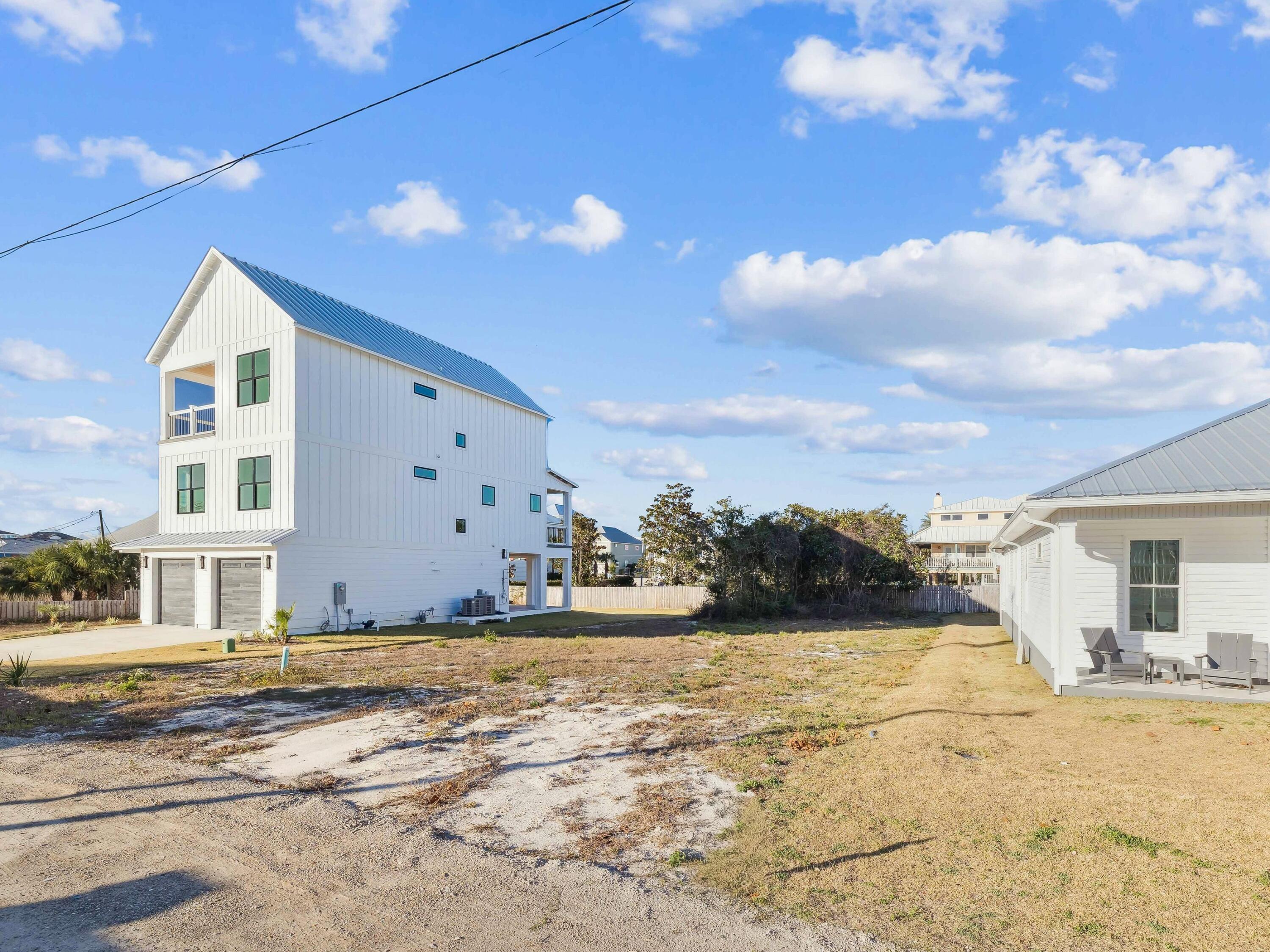 36 Casting Lake Road Miramar Beach, FL 32550 - Photo 6 of 11 a view of white house with a yard