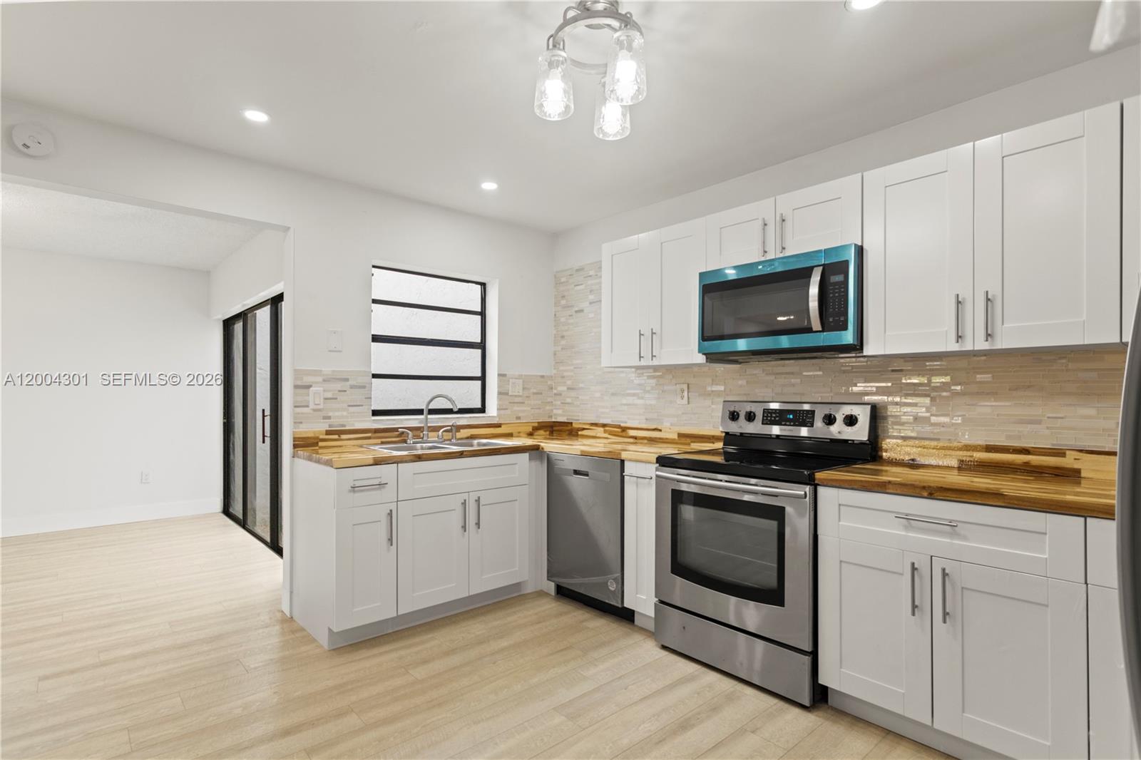 6745 Northwest 169th Street, Unit G Hialeah, FL 33015 - Photo 4 of 29