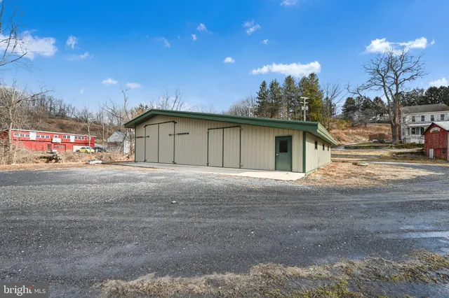 a view of a house with a street