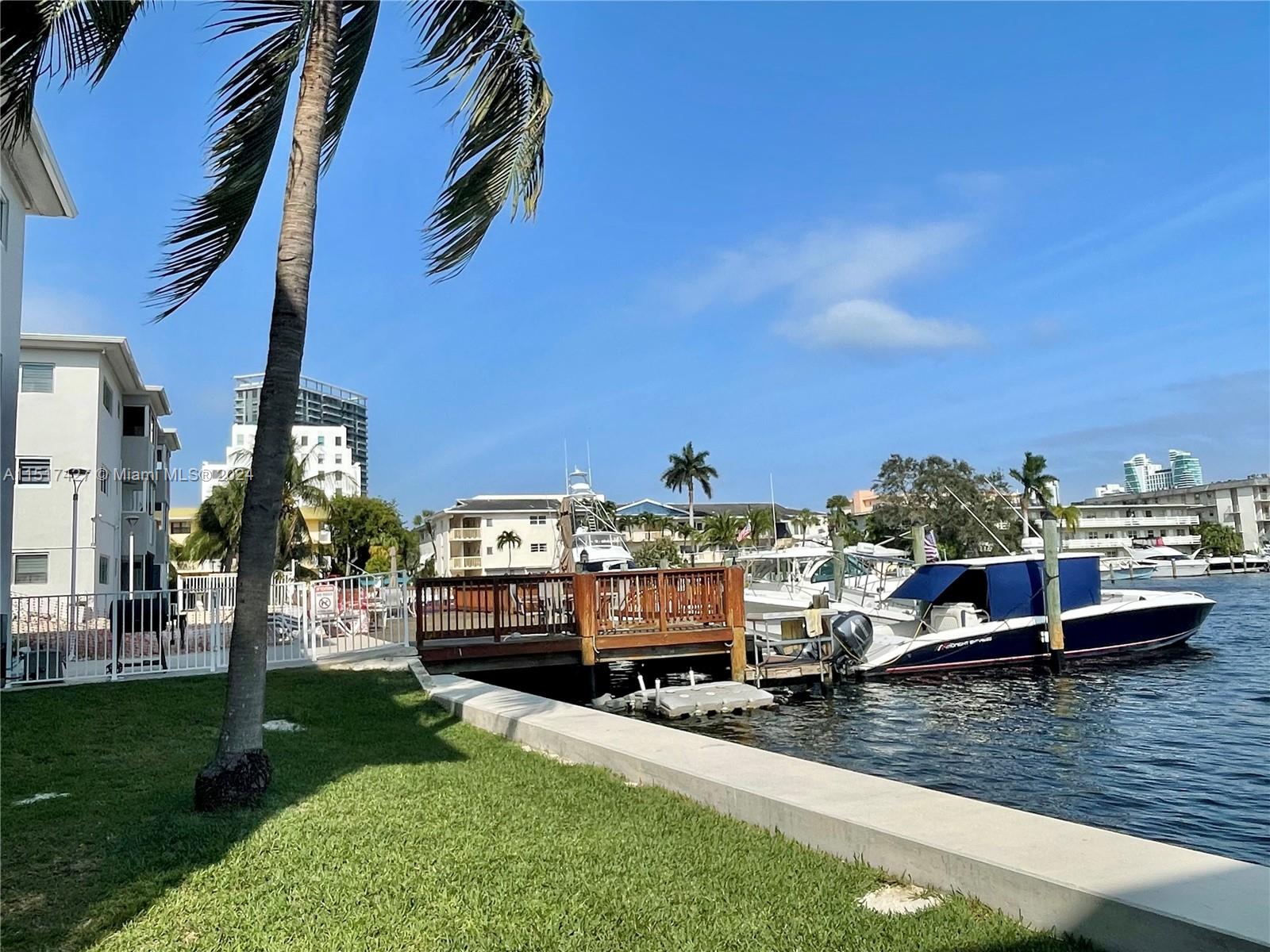462 Golden Isles Drive, Unit 210 Hallandale Beach, FL 33009 - Photo 20 of 41 a view of a house with a ocean view