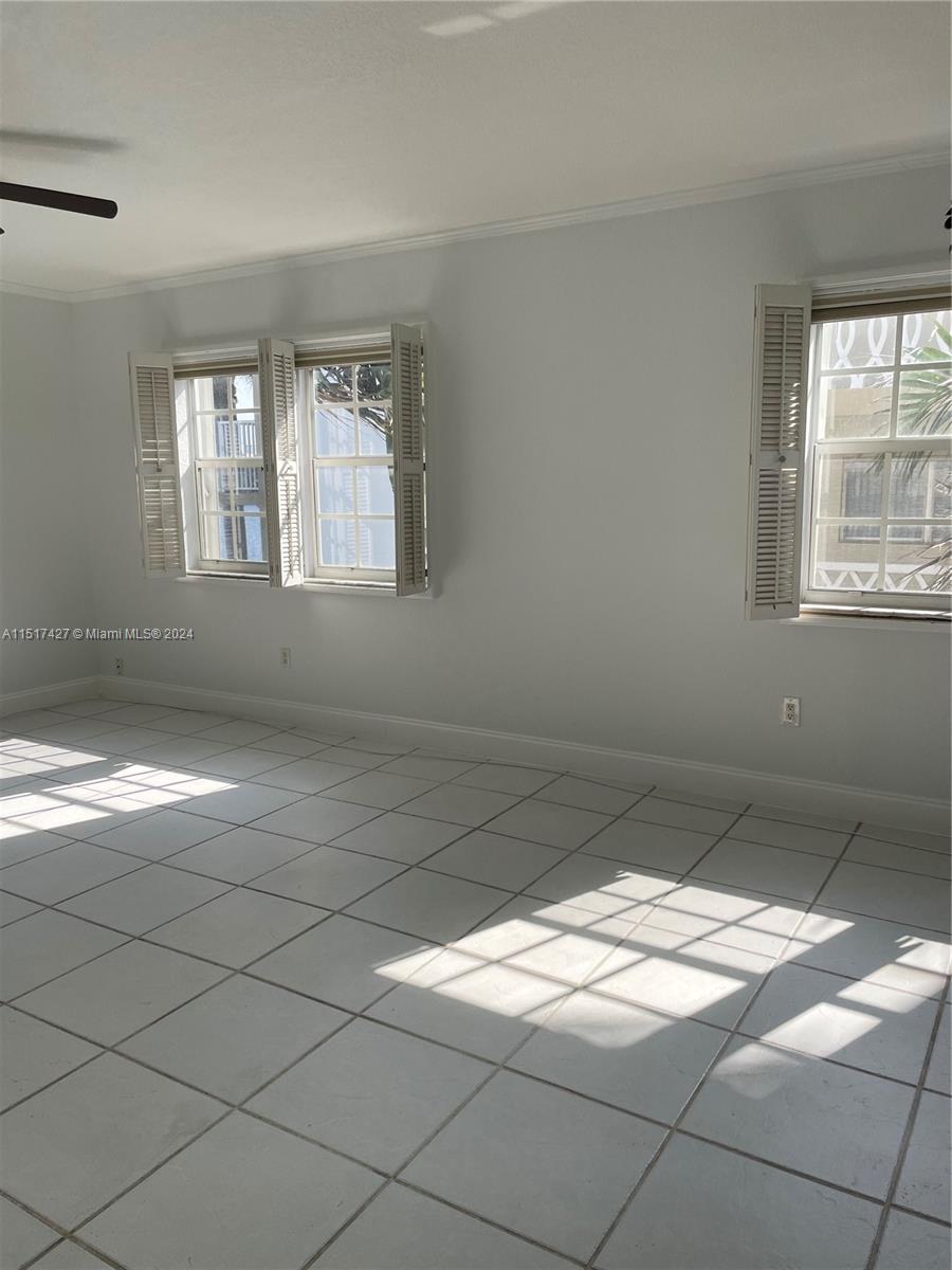 462 Golden Isles Drive, Unit 210 Hallandale Beach, FL 33009 - Photo 28 of 41 a view of empty room with window