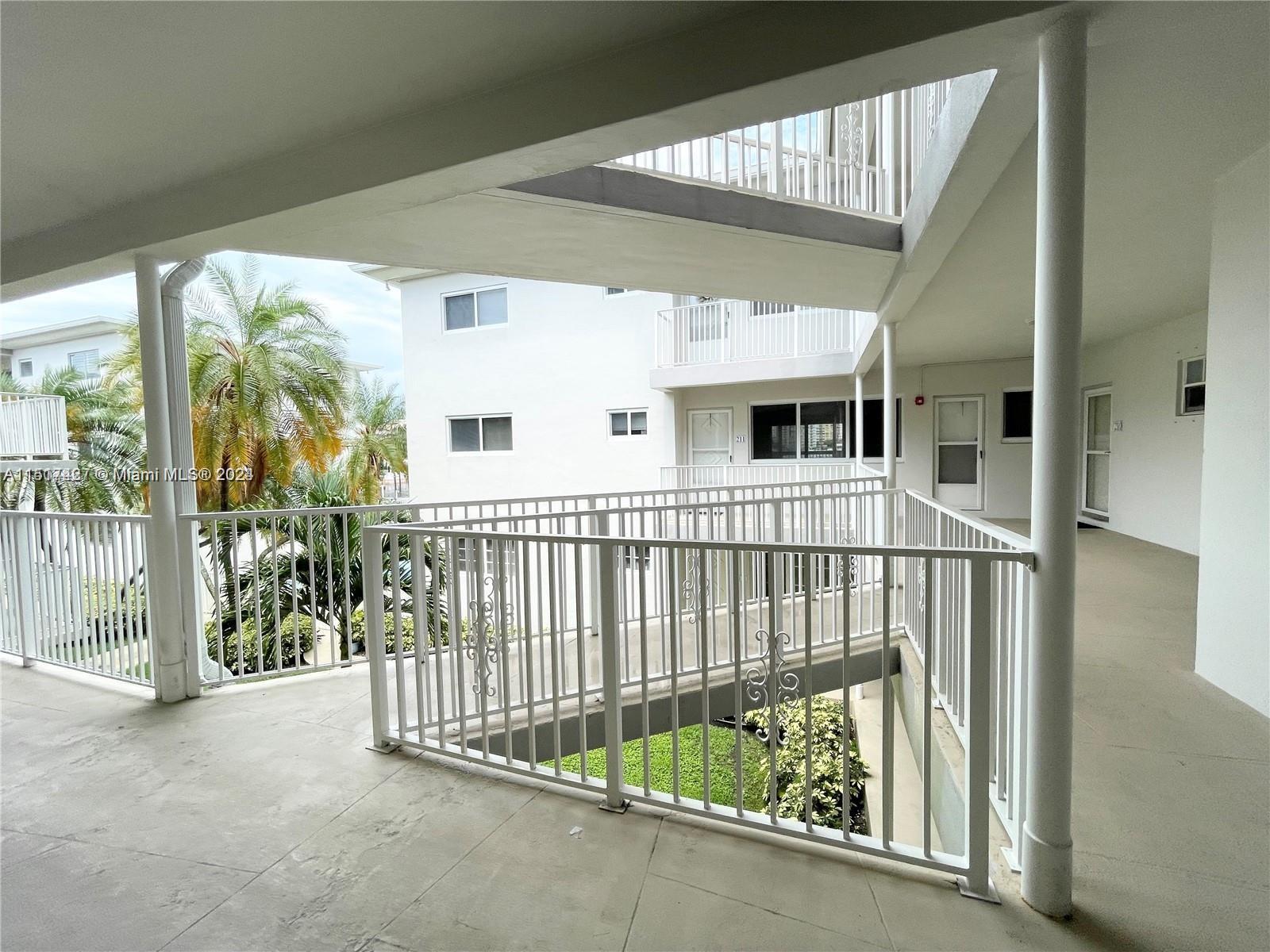 462 Golden Isles Drive, Unit 210 Hallandale Beach, FL 33009 - Photo 7 of 41 a view of a balcony