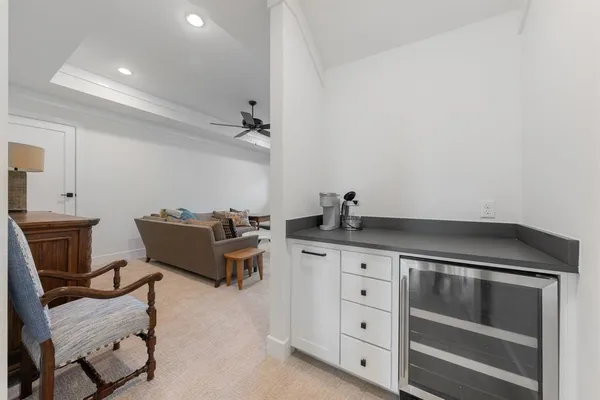 a kitchen with granite countertop a stove and a sink