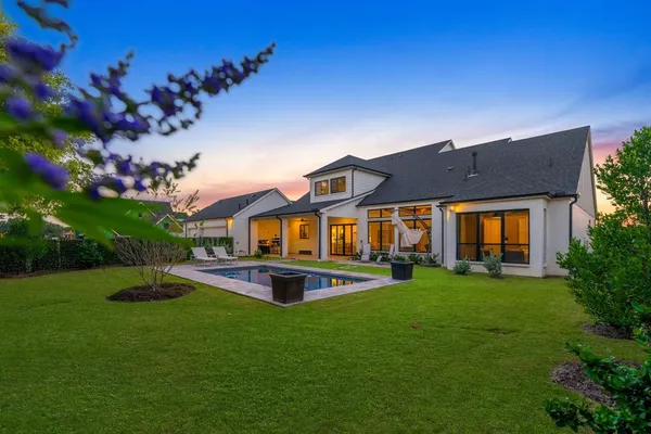 a view of a house with a big yard