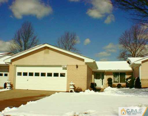 784 Pompton Road Monroe Township, NJ 08831 - Photo 1 of 4 a front view of a house with a yard