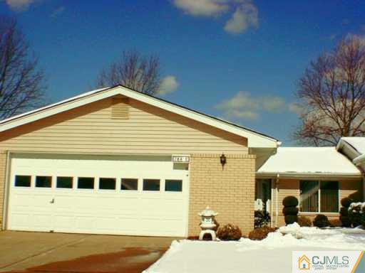 784 Pompton Road Monroe Township, NJ 08831 - Photo 2 of 4 a front view of a house with a yard