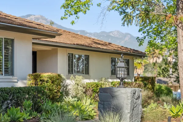 front view of house with a potted plant