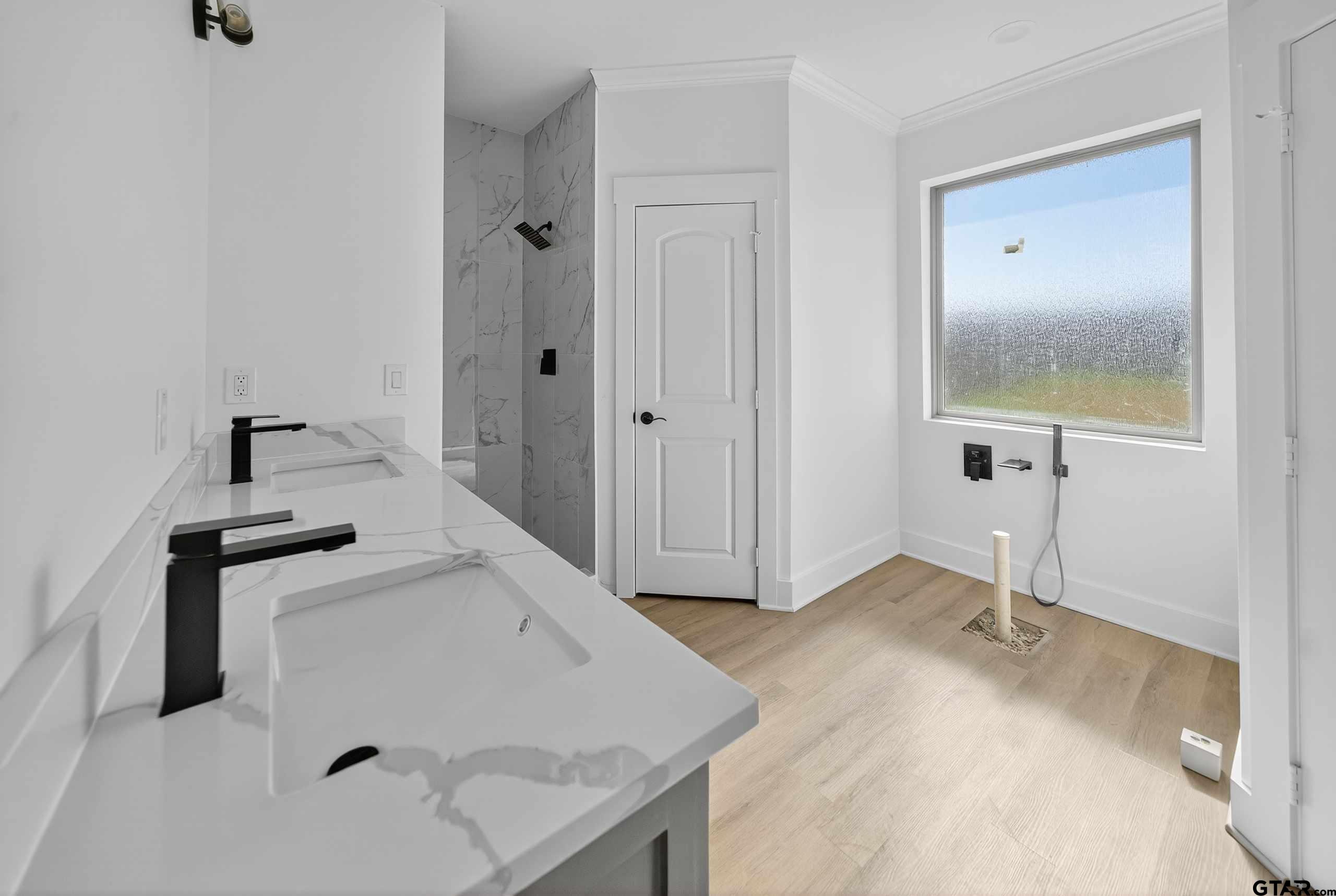 173 Sides Boulevard Bullard, TX 75757 - Photo 21 of 48 a bathroom with a sink and mirror