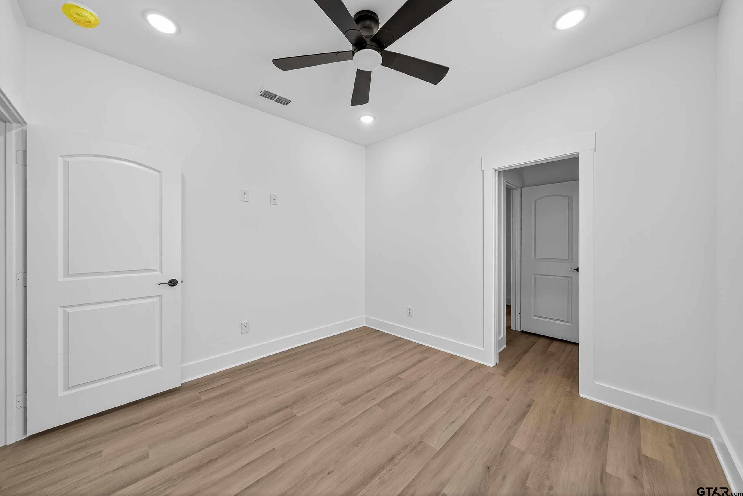 173 Sides Boulevard Bullard, TX 75757 - Photo 26 of 48 wooden floor in an empty room with a window