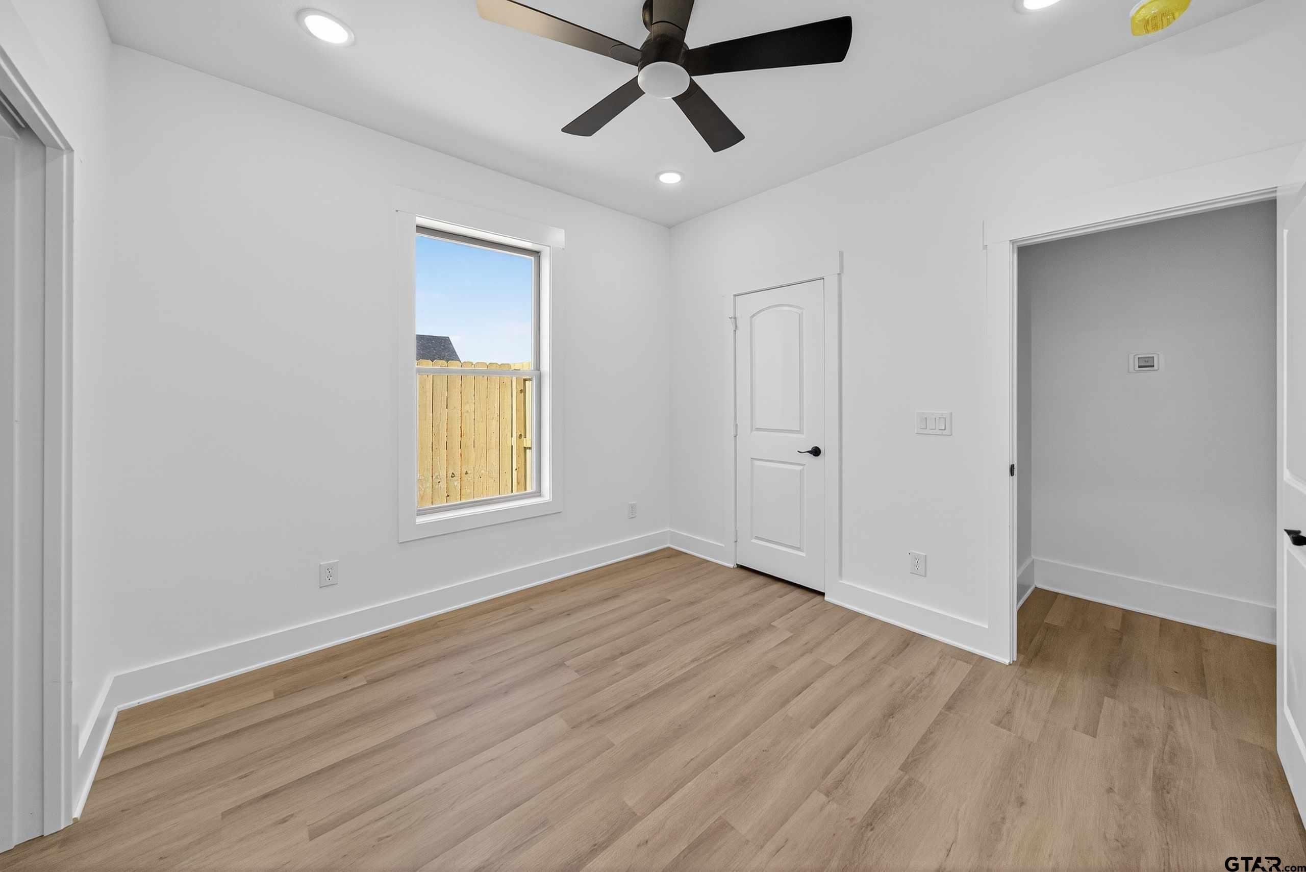 173 Sides Boulevard Bullard, TX 75757 - Photo 31 of 48 a view of empty room with wooden floor and fan