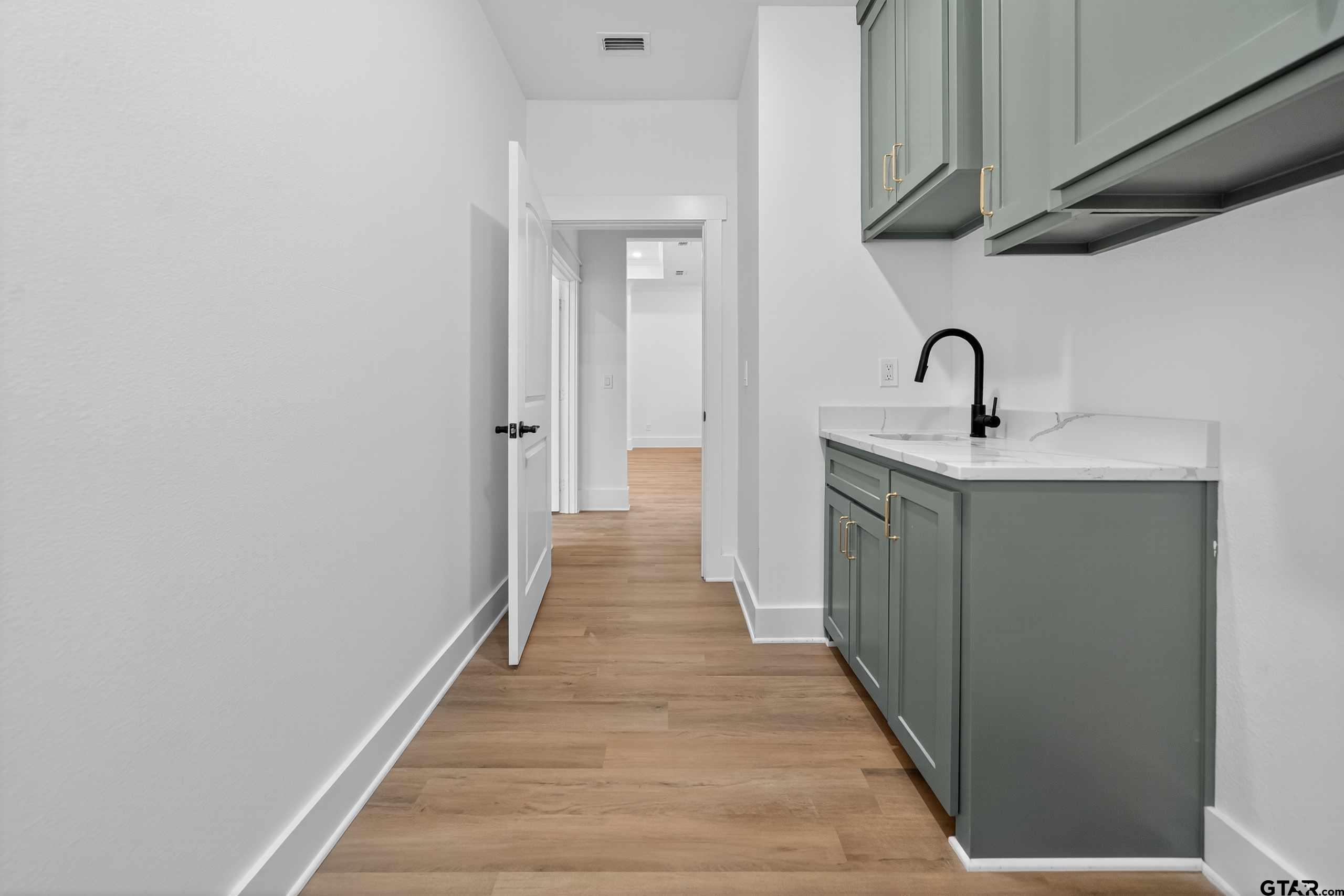 173 Sides Boulevard Bullard, TX 75757 - Photo 42 of 48 a hallway with sink