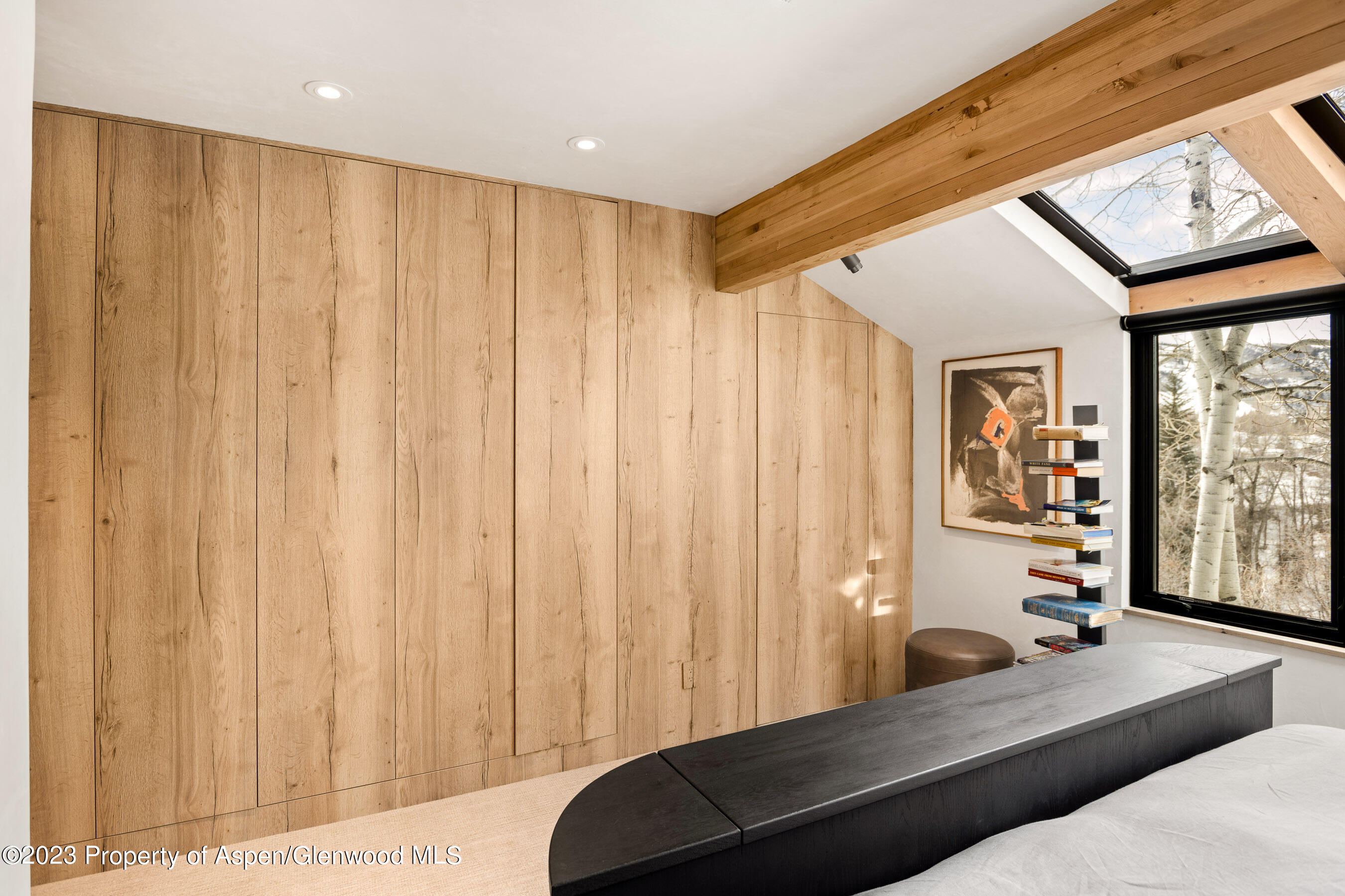 100 North 8th Street, Unit 15 Aspen, CO 81611 - Photo 12 of 27 a living room with a large window and couch