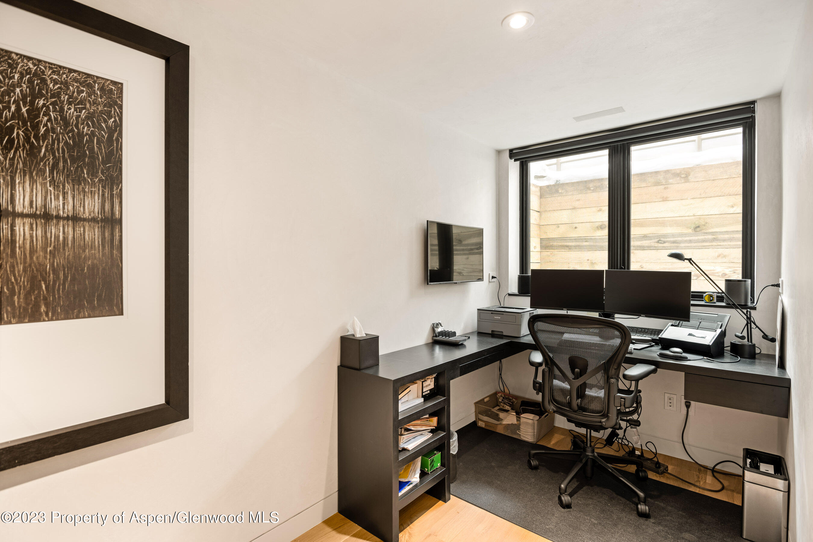 100 North 8th Street, Unit 15 Aspen, CO 81611 - Photo 18 of 27 a view of a workspace with furniture and a window