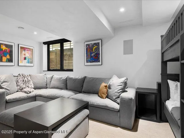 a living room with furniture and a couch