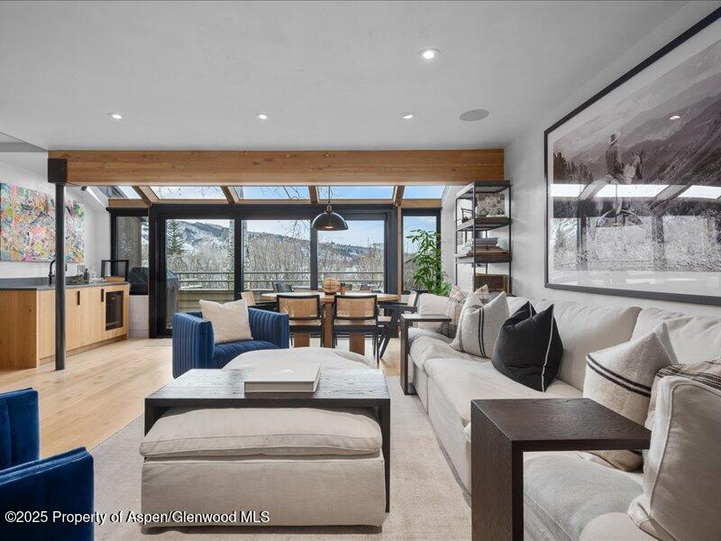 100 North 8th Street, Unit 15 Aspen, CO 81611 - Photo 4 of 27 a living room with furniture and a large window