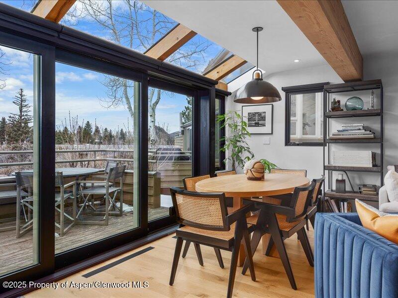 100 North 8th Street, Unit 15 Aspen, CO 81611 - Photo 8 of 27 a dinning table and chairs in the balcony