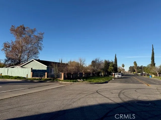 a view of road and car parked on road