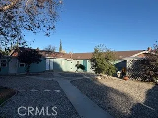 a view of a house with a street