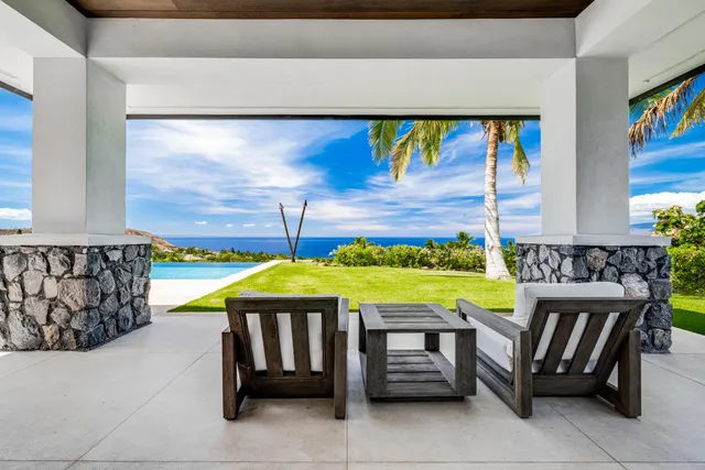a view of kitchen with furniture and window