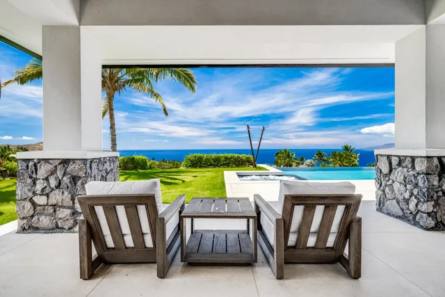 a view of an outdoor dining space with furniture