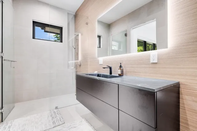 a view of a kitchen with washer and dryer
