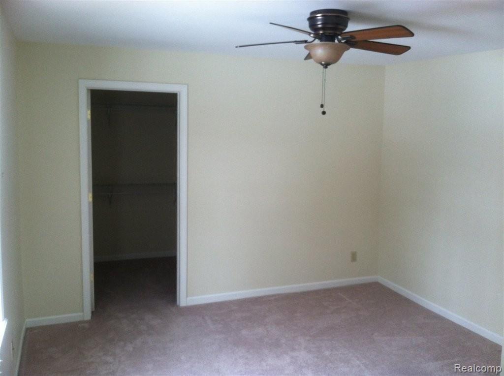 400 Angle Road Lapeer, MI 48446 - Photo 4 of 12 400 angle master bed.JPG