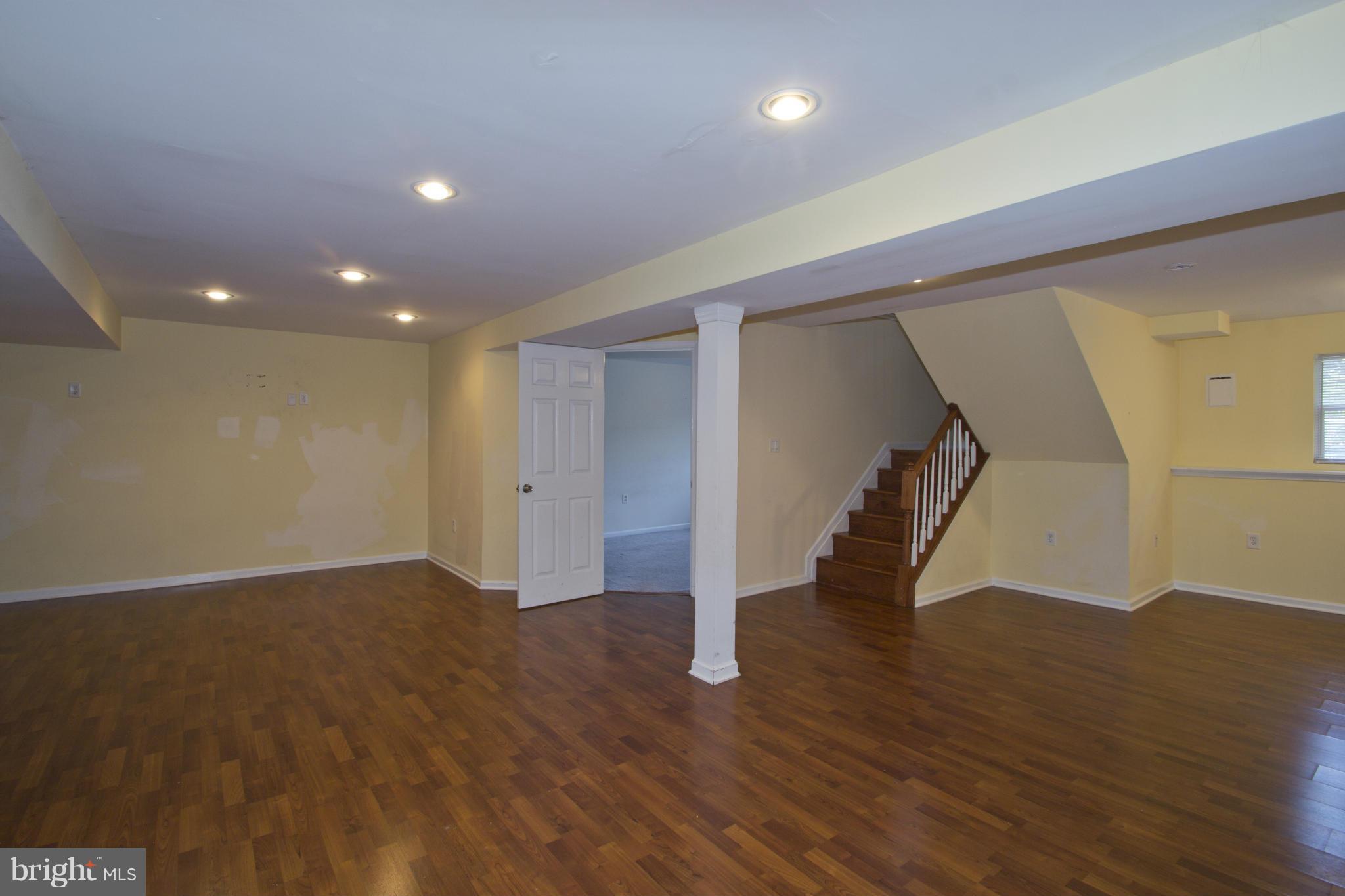 219 Cresswell Road Baltimore, MD 21225 - Photo 18 of 22 Finished Lower Level View Three
