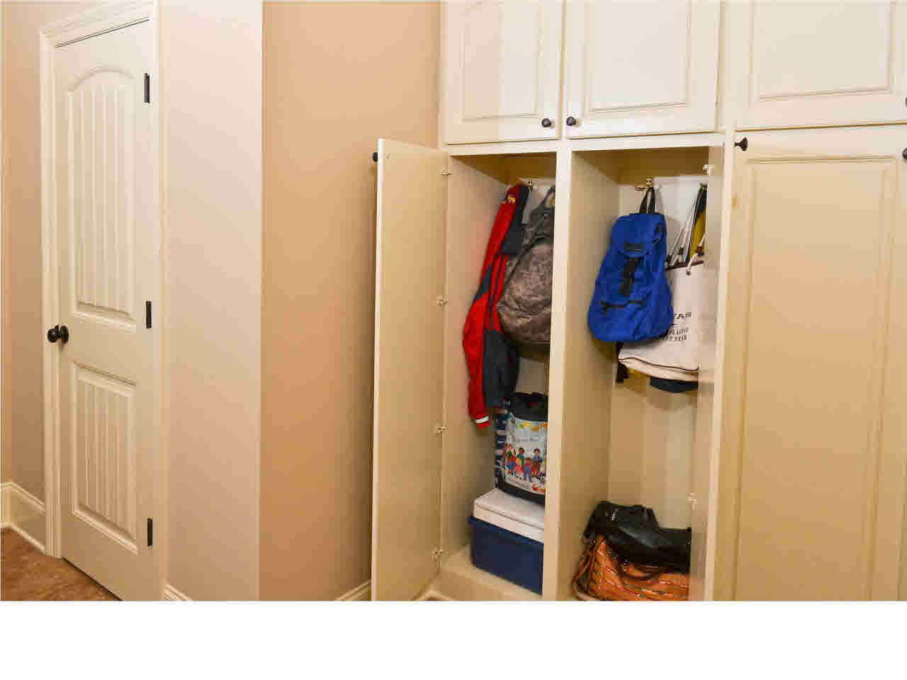 122 Hanover Street Madison, MS 39110 - Photo 15 of 28 Utility area has more storage cabinets.