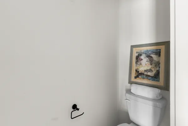 a bathroom with a sink a toilet and a bathtub