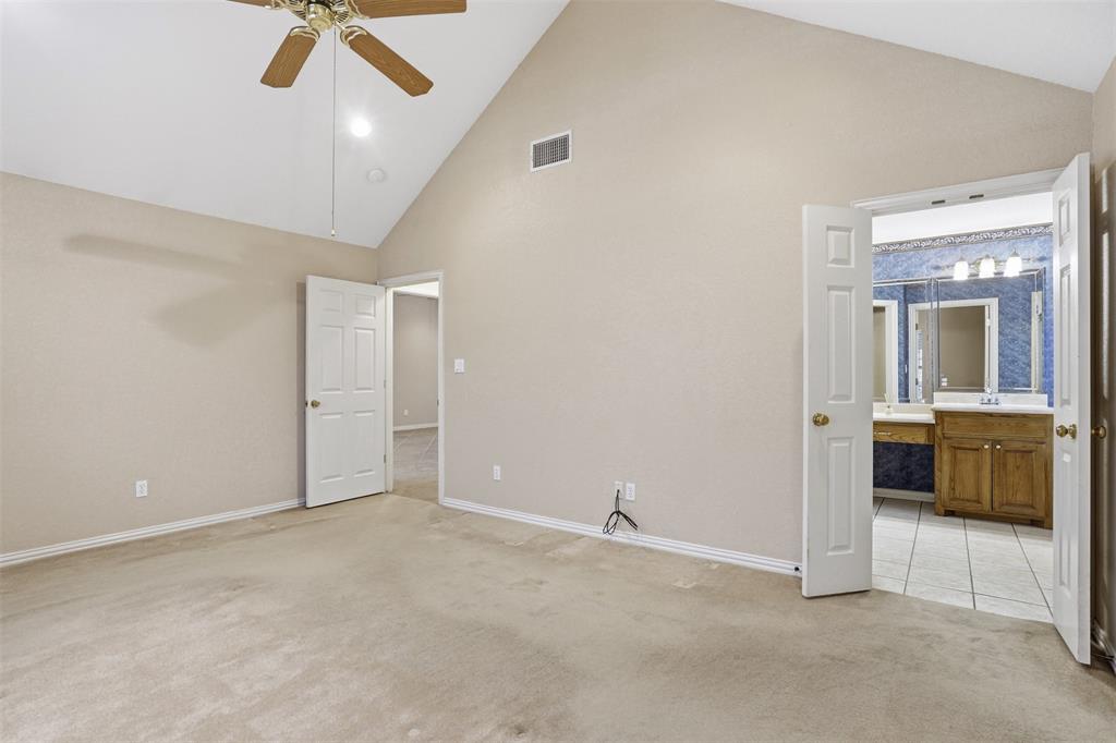 231 Bluff View Court Aledo, TX 76008 - Photo 14 of 34 an empty room with a bathroom and a sink