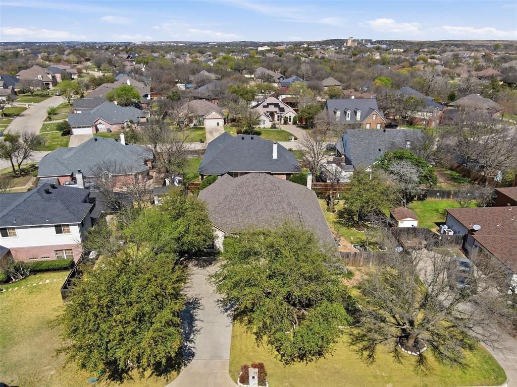 231 Bluff View Court Aledo, TX 76008 - Photo 32 of 34 an aerial view of residential houses with outdoor space and trees