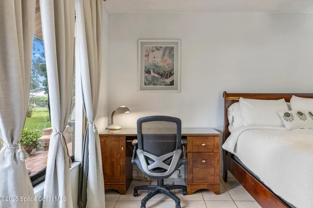a large bathroom with a large tub cabinets and sink
